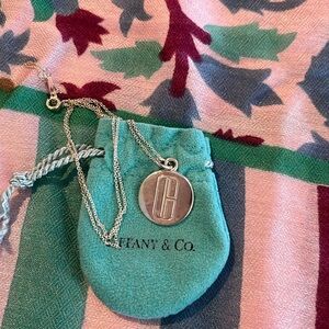 Clinique sterling silver pendant by Tiffany